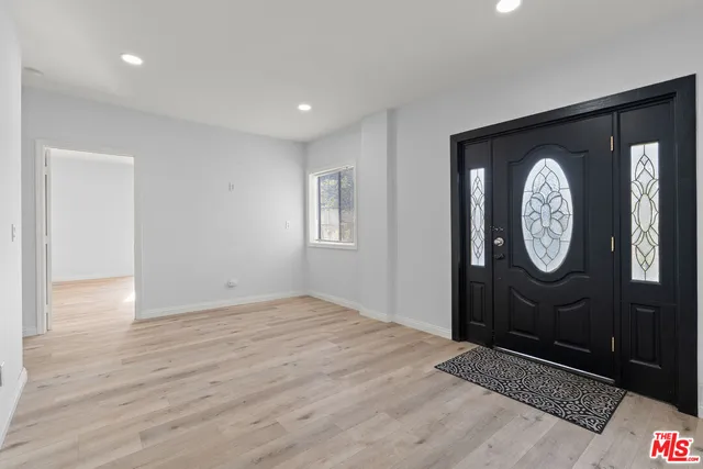 a view of a hallway with elevator