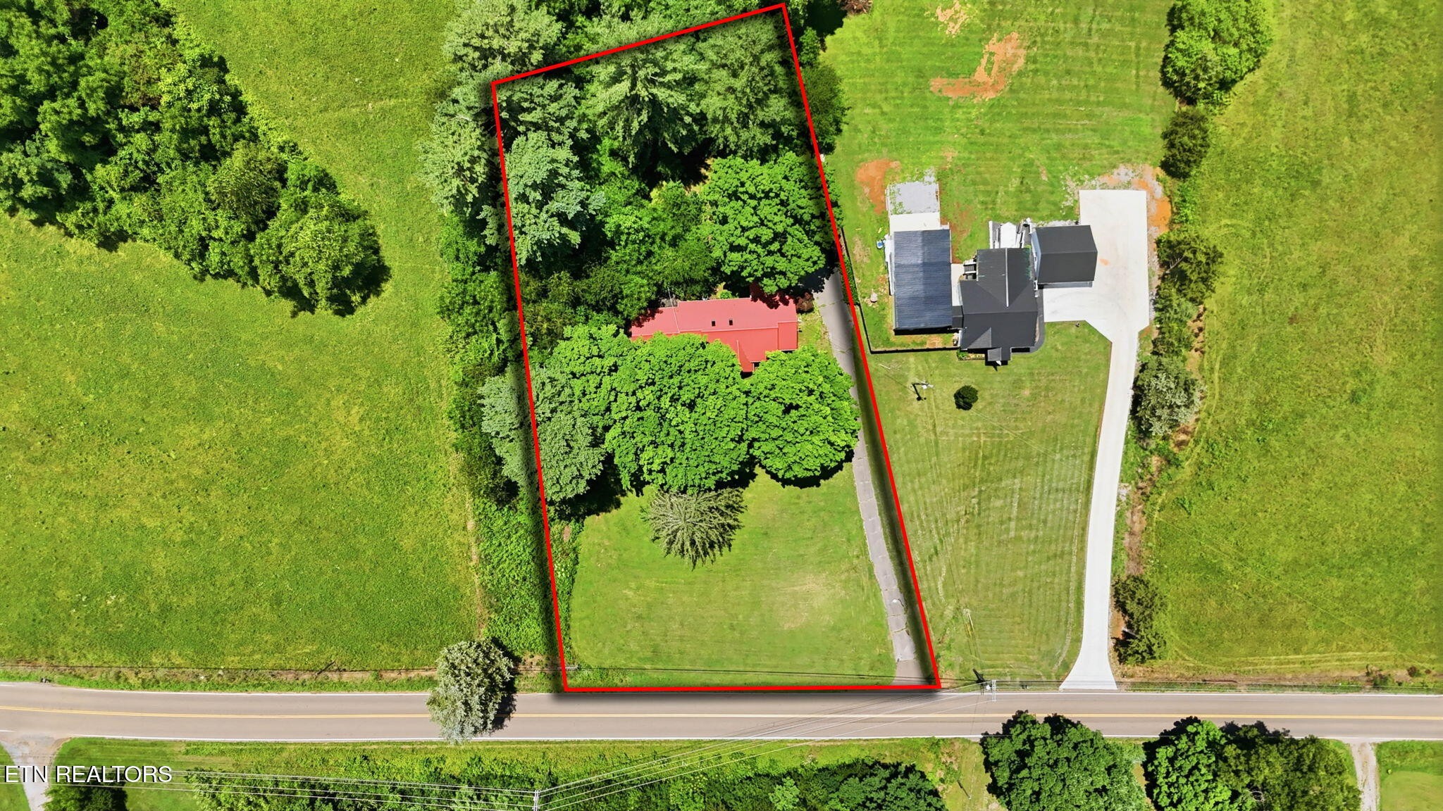 3992 Highway 92 Rutledge, TN 37861 - Photo 34 of 34 an aerial view of a multi story residential apartment building with a yard