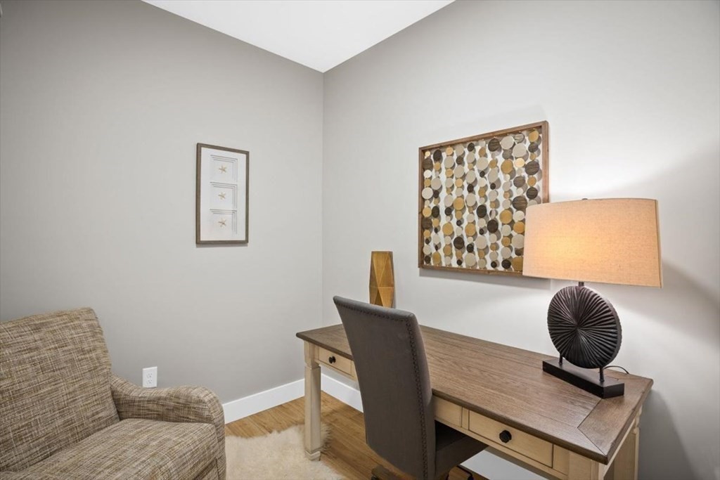 57 Long Point Road, Unit 208 Lakeville, MA 02347 - Photo 12 of 27 a living room with furniture and a window