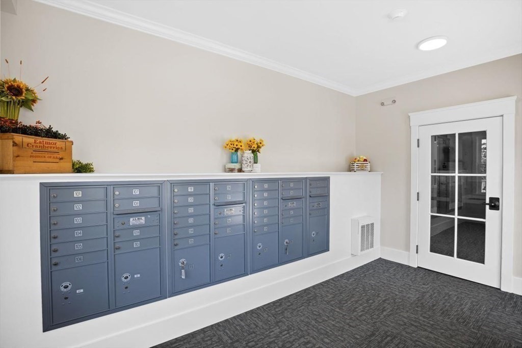 57 Long Point Road, Unit 208 Lakeville, MA 02347 - Photo 19 of 27 a view of empty room with cabinet