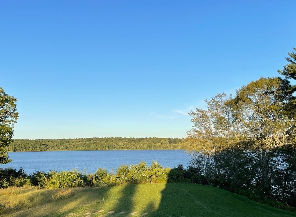 57 Long Point Road, Unit 208 Lakeville, MA 02347 - Photo 2 of 27 a view of a lake and a mountain in the background