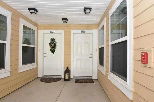a view of hallway with washer and dryer