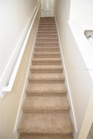 a view of a backyard of the house