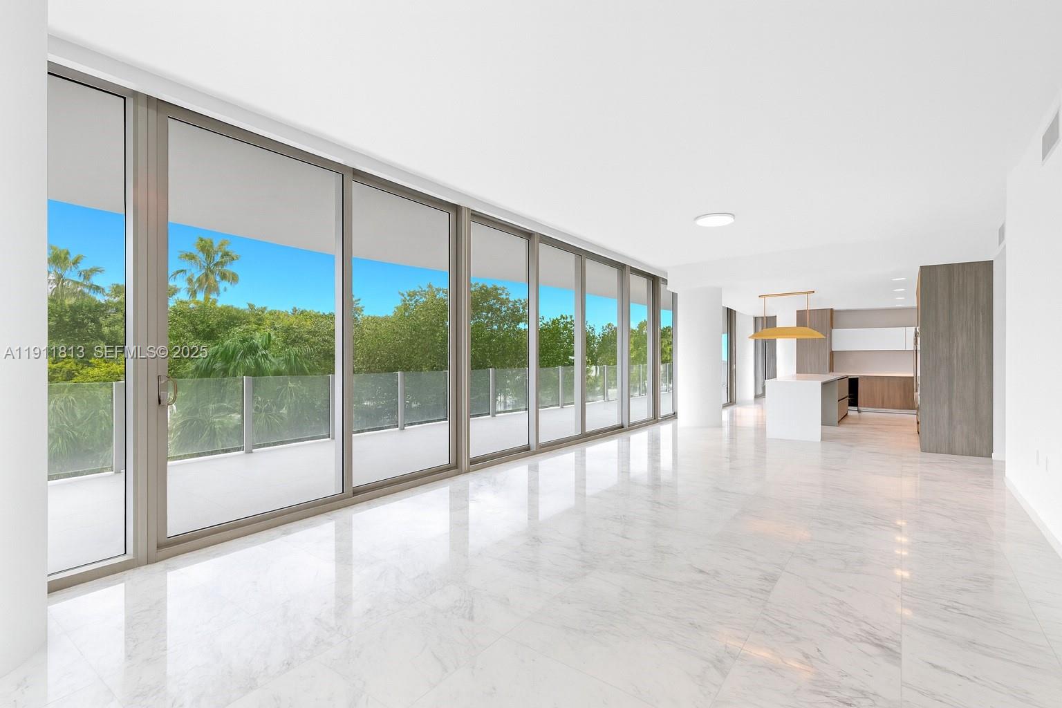 350 Ocean Drive, Unit 301N Key Biscayne, FL 33149 - Photo 18 of 41 a view of empty room with floor to ceiling window