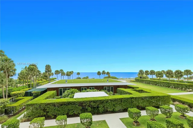 a view of a swimming pool with a garden