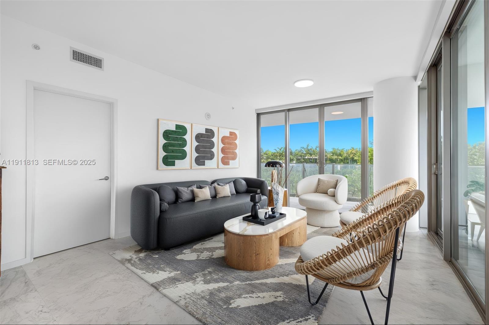 350 Ocean Drive, Unit 301N Key Biscayne, FL 33149 - Photo 27 of 41 a living room with furniture and a large window