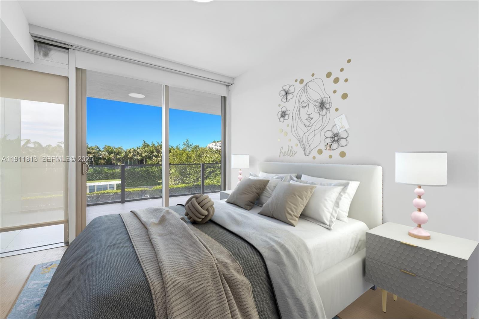 350 Ocean Drive, Unit 301N Key Biscayne, FL 33149 - Photo 29 of 41 a bedroom with a large bed and a lamp next to a window