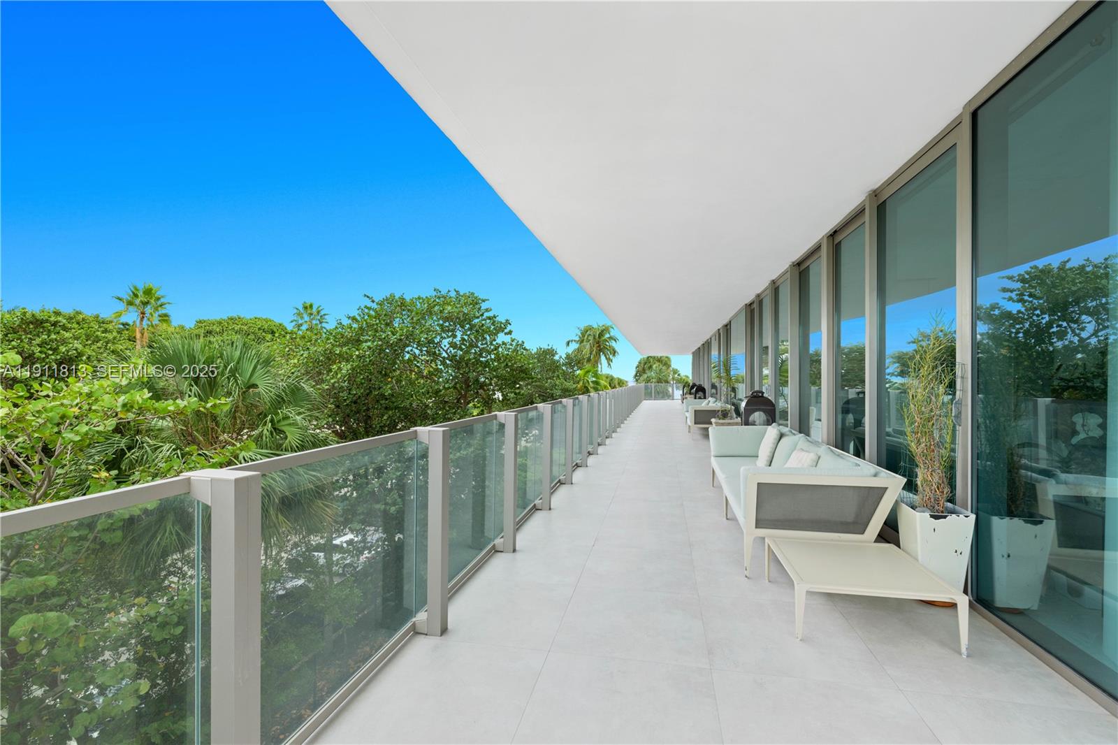 350 Ocean Drive, Unit 301N Key Biscayne, FL 33149 - Photo 35 of 41 a balcony with chairs