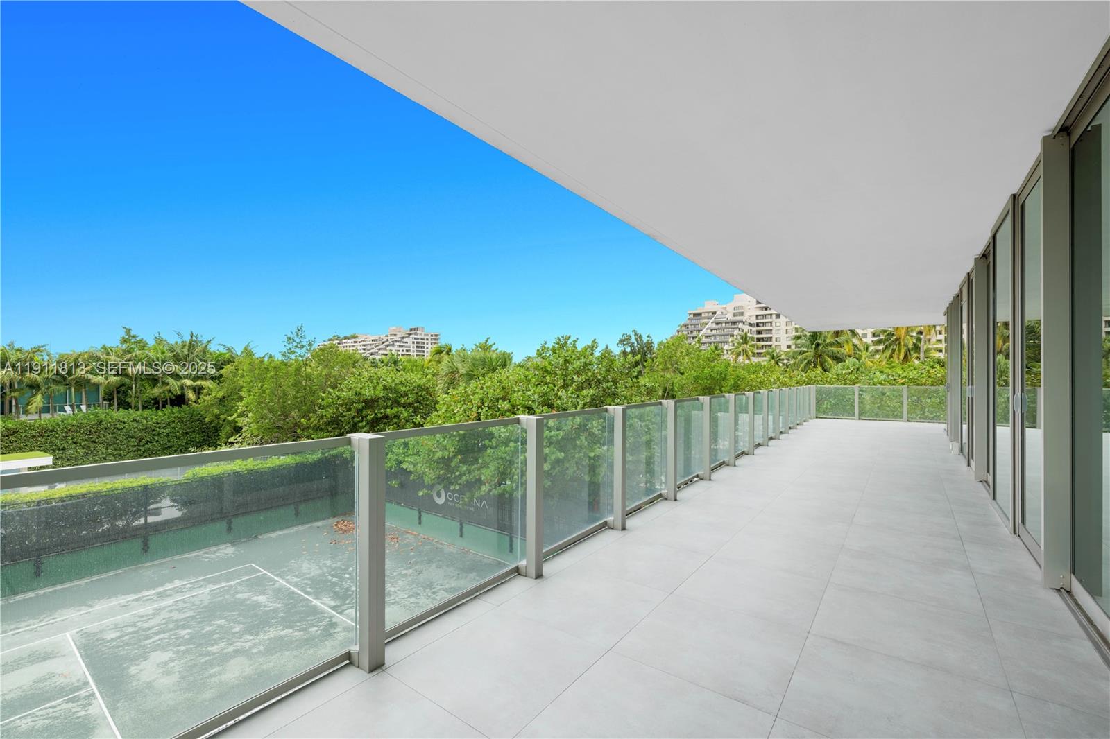 350 Ocean Drive, Unit 301N Key Biscayne, FL 33149 - Photo 37 of 41 a view of a balcony with backyard