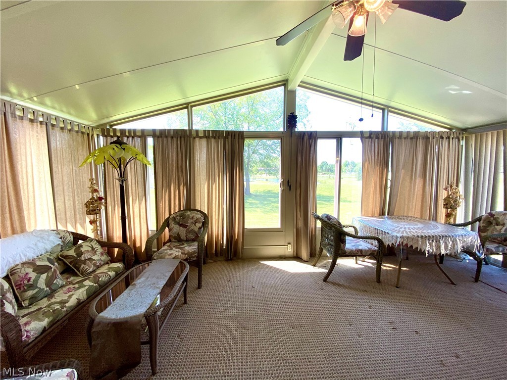 7898 Spieth Road Litchfield, OH 44253 - Photo 26 of 34 Large sunroom overlooks the gorgeous pond!