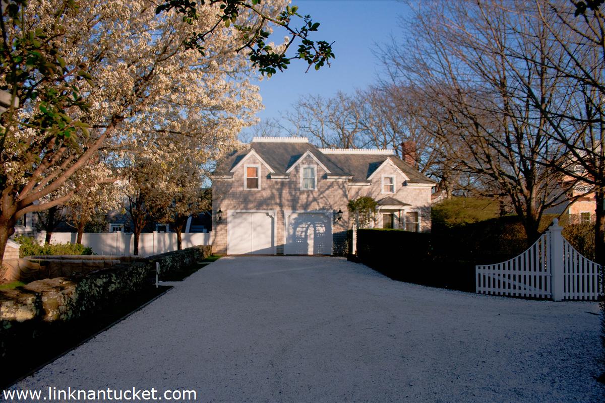 27 Cliff Road Nantucket, MA 02554 - Photo 29 of 32 a view of a house with a street