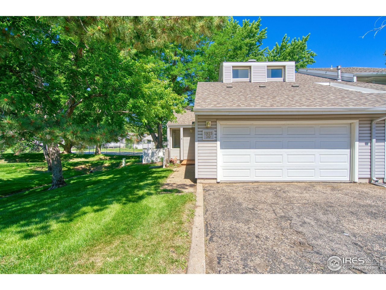 1925 28th Avenue, Unit 30 Greeley, CO 80634 - Photo 1 of 34 a house view with a outdoor space