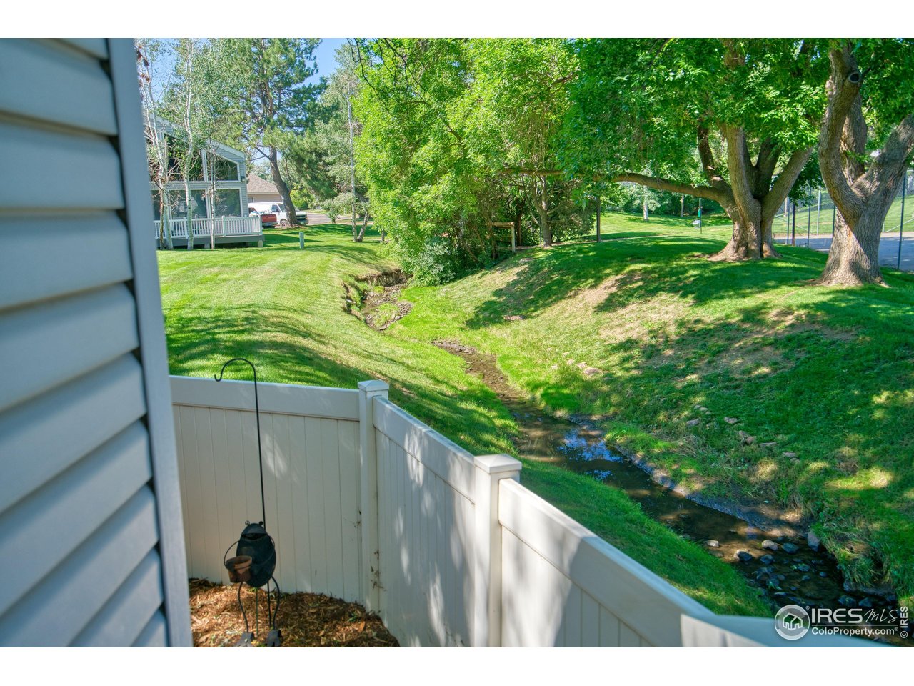1925 28th Avenue, Unit 30 Greeley, CO 80634 - Photo 23 of 34 a view of a garden from a balcony