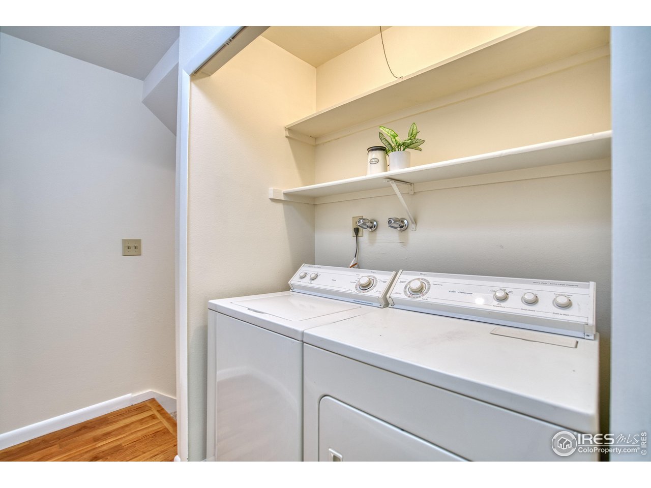 1925 28th Avenue, Unit 30 Greeley, CO 80634 - Photo 26 of 34 a utility room with dryer and washer