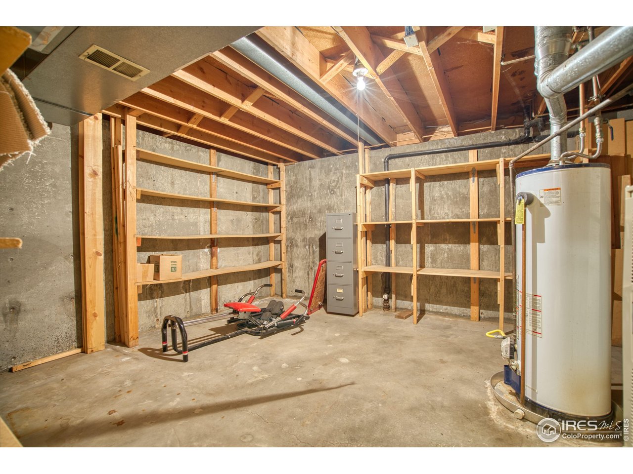 1925 28th Avenue, Unit 30 Greeley, CO 80634 - Photo 33 of 34 a view of a room with gym equipment