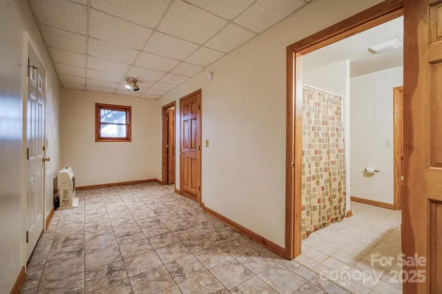 a view of an empty room and window