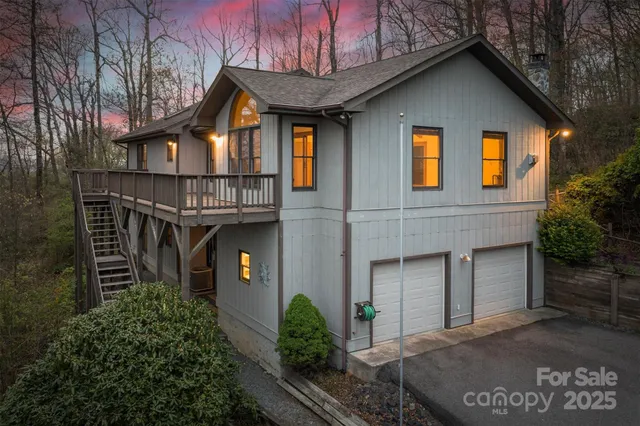 a front view of a house with glass windows