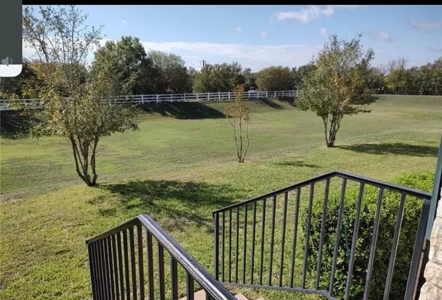 a view of a balcony with lake