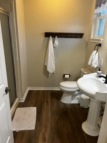 a bathroom with a sink and a toilet