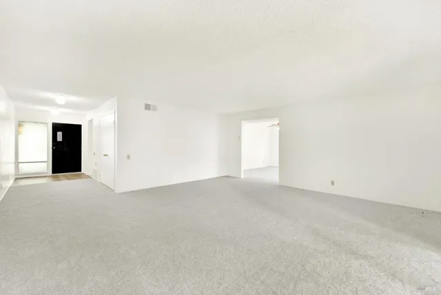 an empty room with an empty space