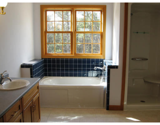 18 Minott Road Westminster, MA 01473 - Photo 9 of 9 a bathroom with a bathtub and a sink