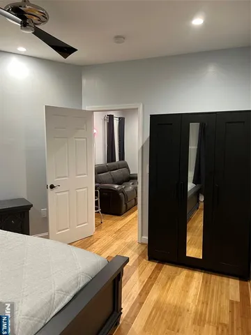 a kitchen with a refrigerator and a stove