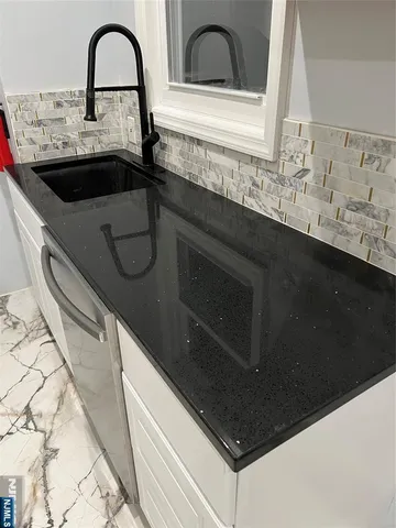 a close view of sink and tap