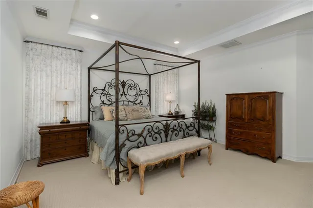 a bedroom with furniture and window