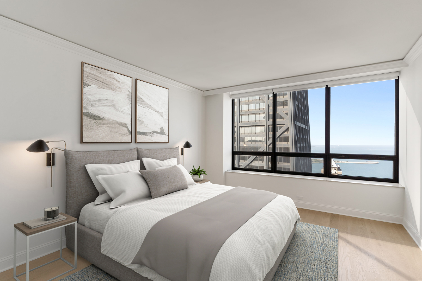 180 East Pearson Street, Unit 3502 Chicago, IL 60611 - Photo 12 of 33 a bedroom with a large bed and a large window