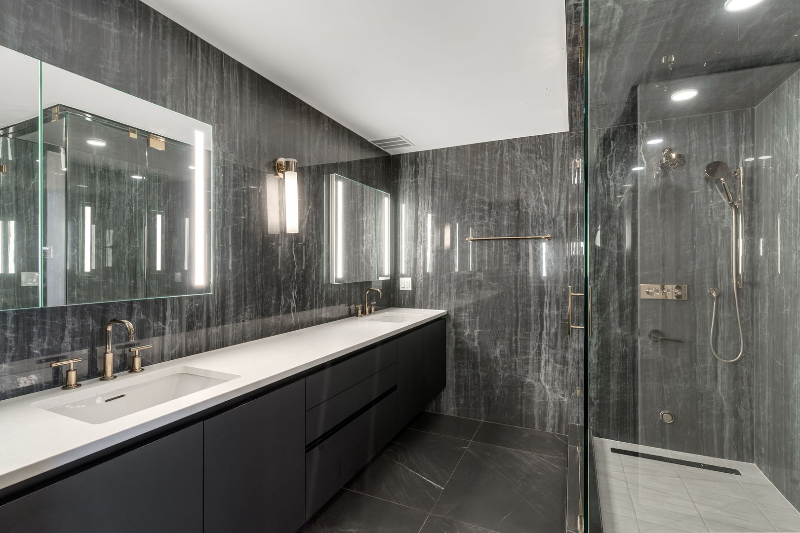 180 East Pearson Street, Unit 3502 Chicago, IL 60611 - Photo 17 of 33 a bathroom with a double vanity sink mirror and shower