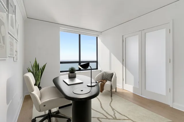 an empty room with windows and closet