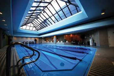 a kitchen with a table and chairs