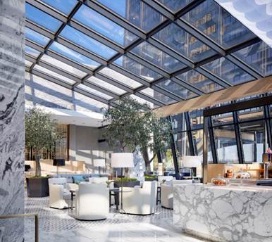 180 East Pearson Street, Unit 3502 Chicago, IL 60611 - Photo 28 of 33 a view of a patio with couches table and chairs and potted plants