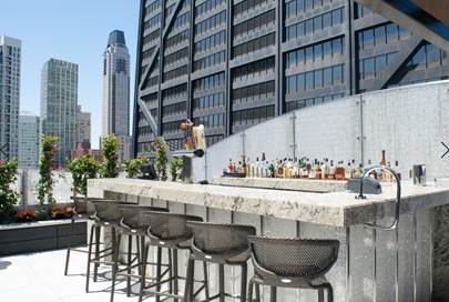 180 East Pearson Street, Unit 3502 Chicago, IL 60611 - Photo 30 of 33 a kitchen with a table and chairs
