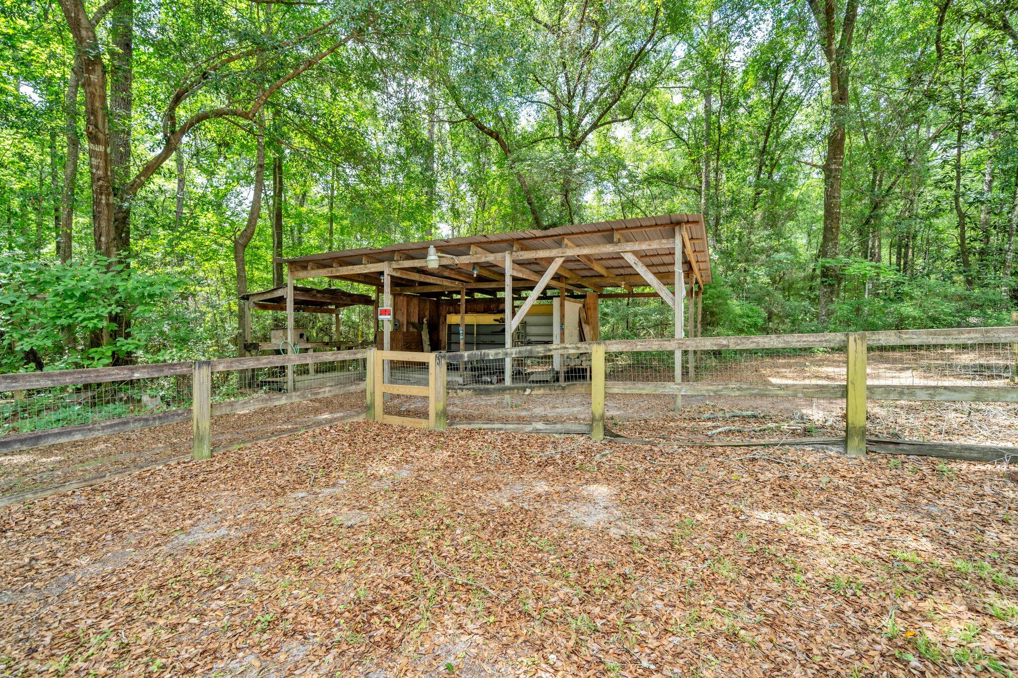 5241 Bob Sikes Road DeFuniak Springs, FL 32435 - Photo 4 of 35 a view of a backyard