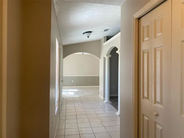 a view of a hallway with interior of the house