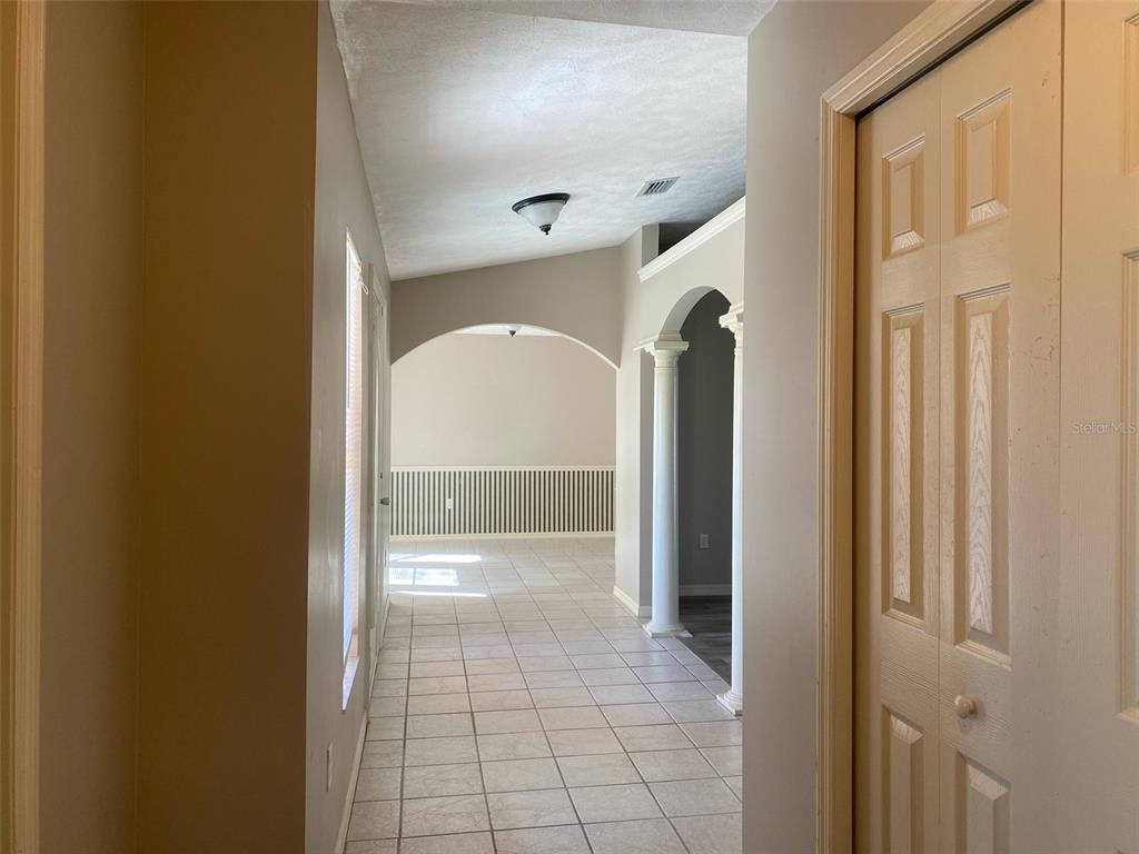 5881 Southwest 86th Place Ocala, FL 34476 - Photo 17 of 18 a view of a hallway with interior of the house