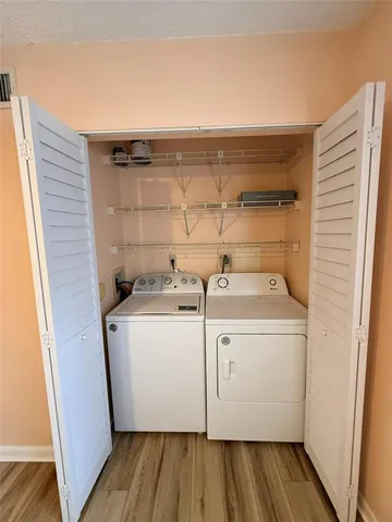 a utility room with dryer and washer