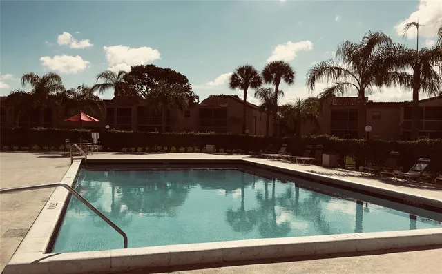a view of swimming pool from a window