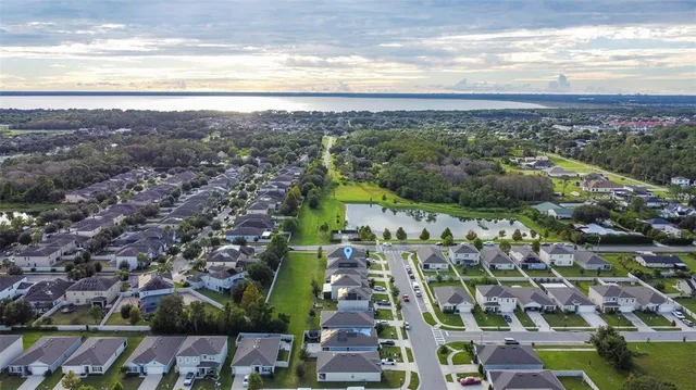 a view of a city with mountains in the background