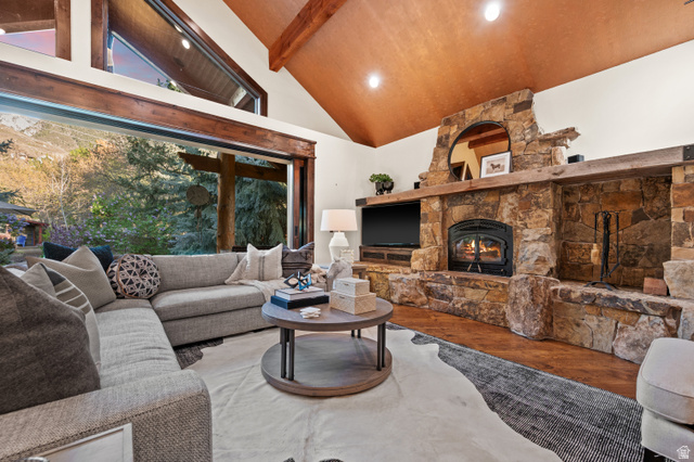 10280 Dimple Dell Road Sandy, UT 84092 - Photo 10 of 58 Living room with wood finished floors, lofted ceiling, a fireplace, and recessed lighting