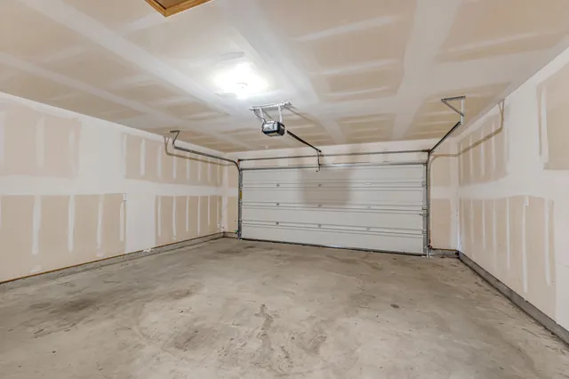 a house view with swimming pool and garden space
