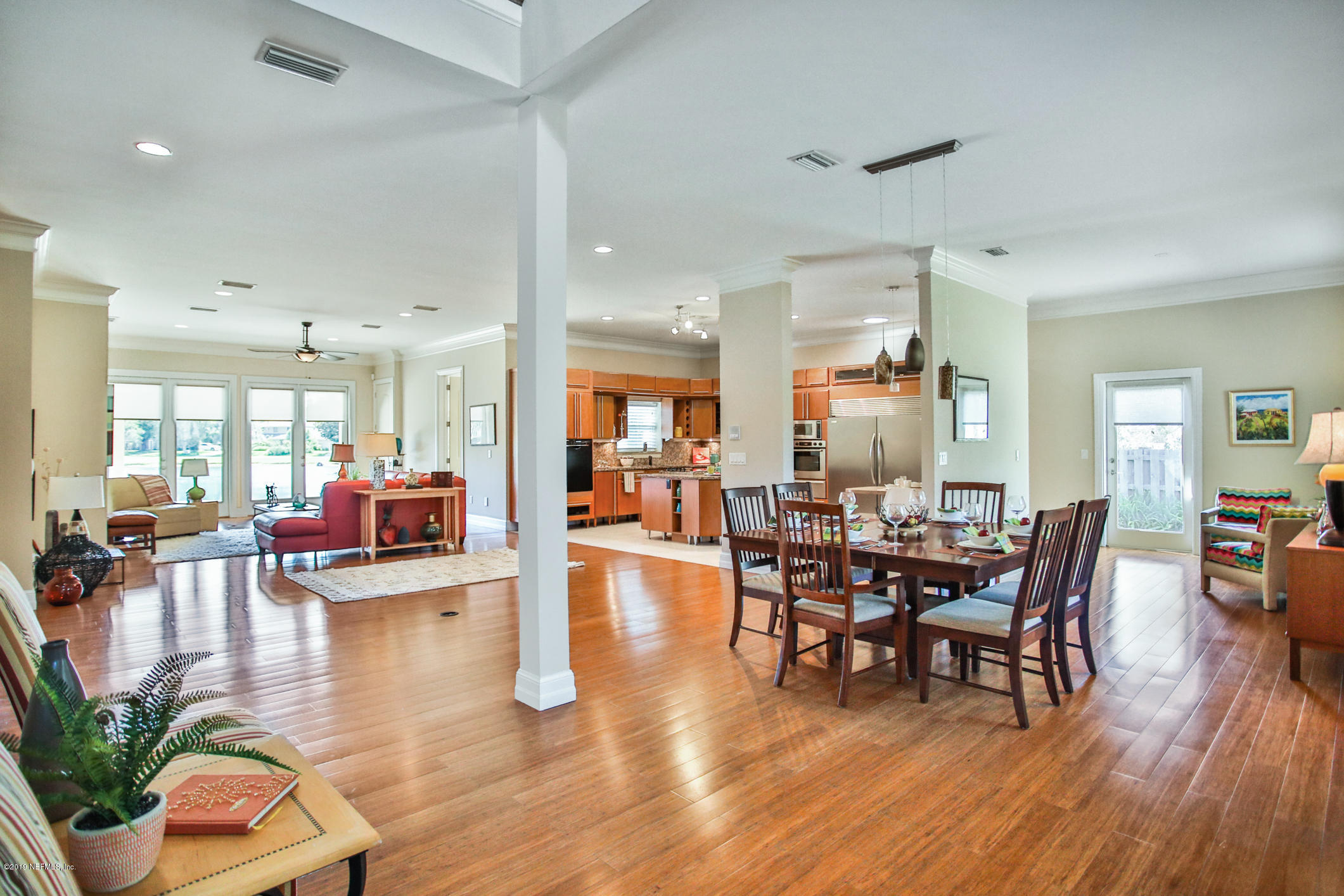7936 Pine Lake Road Jacksonville, FL 32256 - Photo 20 of 70 a view of a dining room with furniture and wooden floor
