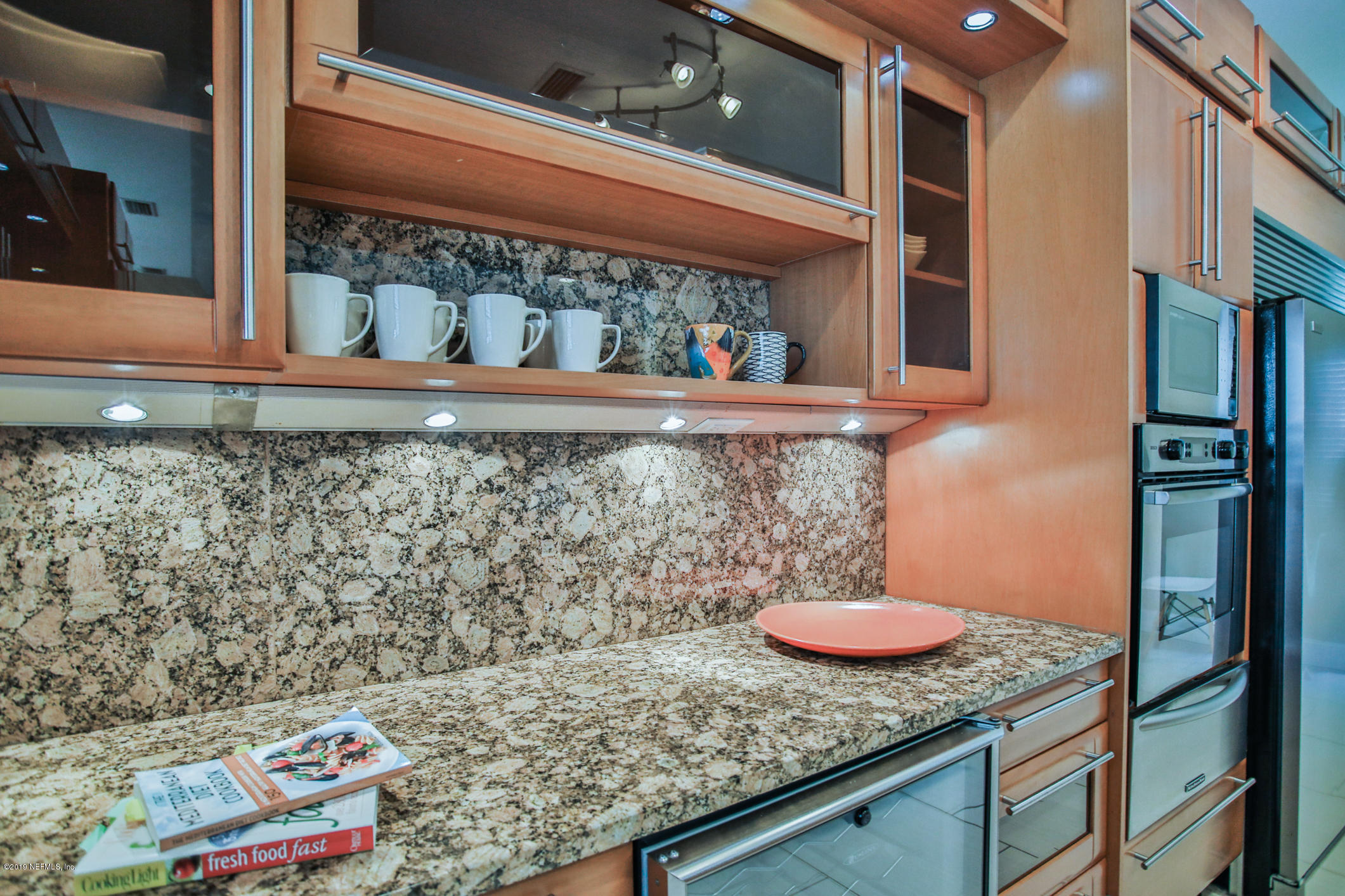 7936 Pine Lake Road Jacksonville, FL 32256 - Photo 24 of 70 a bathroom with a granite countertop sink and a window