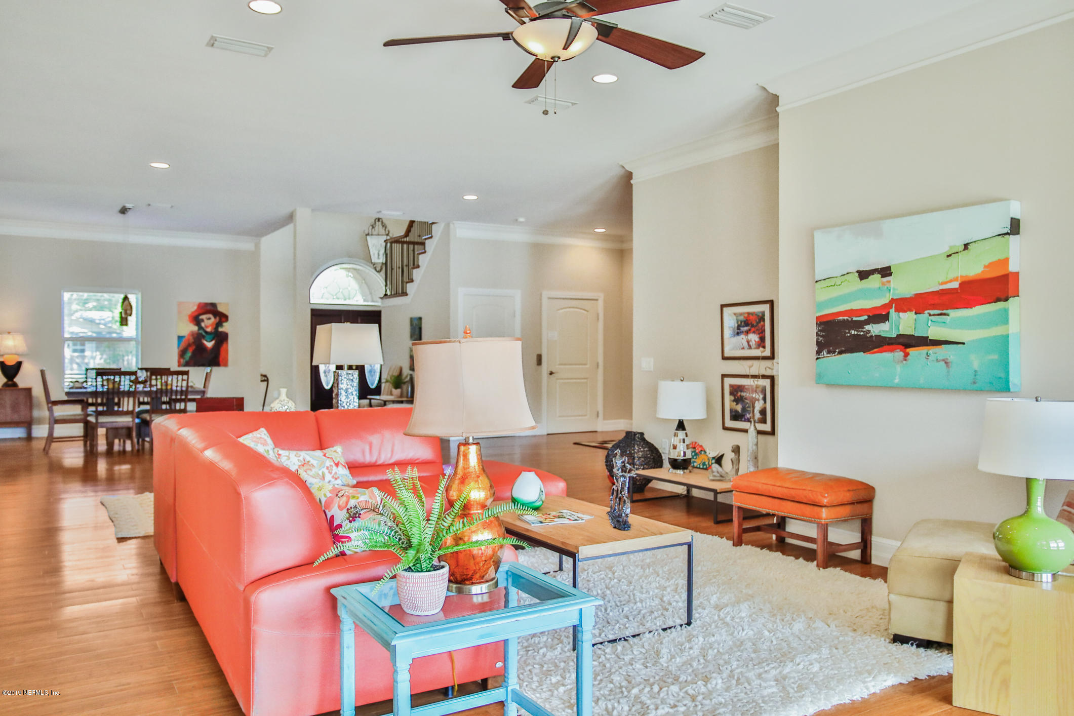 7936 Pine Lake Road Jacksonville, FL 32256 - Photo 31 of 70 a living room with furniture kitchen view and a table