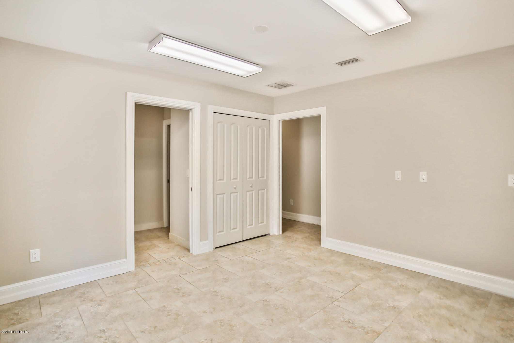7936 Pine Lake Road Jacksonville, FL 32256 - Photo 40 of 70 an empty room with closet area