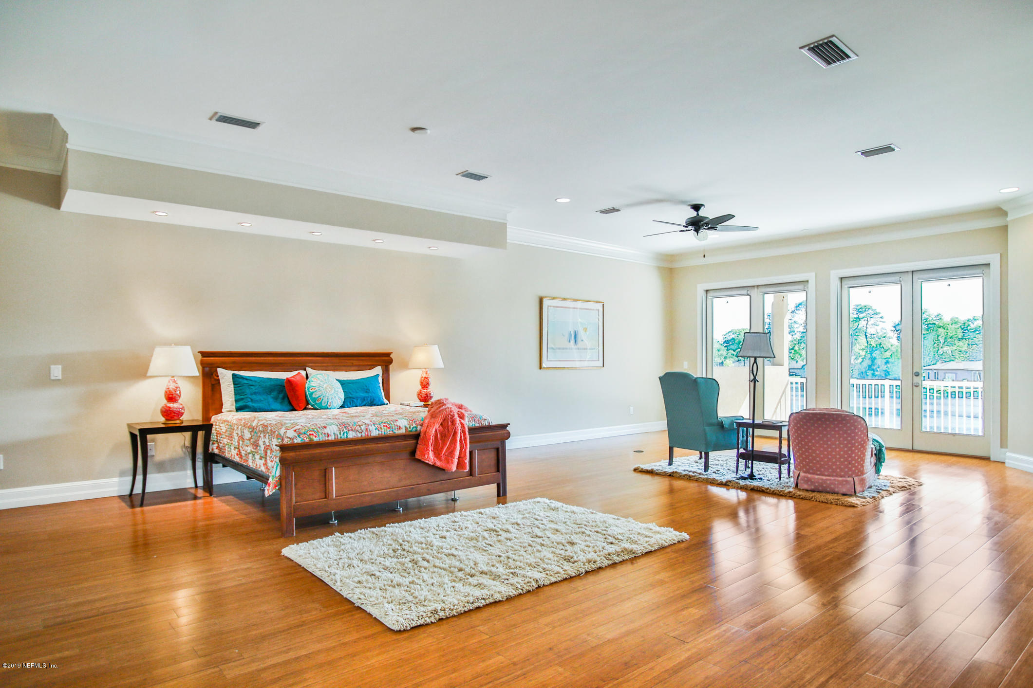 7936 Pine Lake Road Jacksonville, FL 32256 - Photo 49 of 70 a living room with furniture and a wooden floor