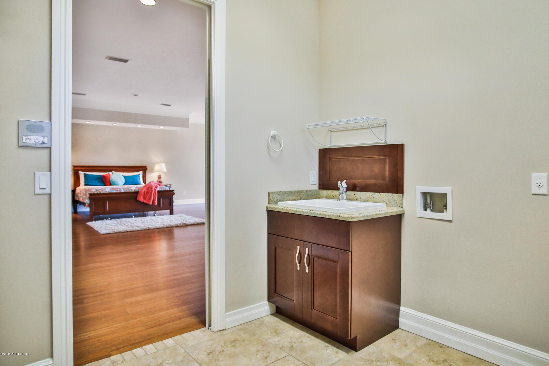 7936 Pine Lake Road Jacksonville, FL 32256 - Photo 59 of 70 a living room with furniture and a flat screen tv