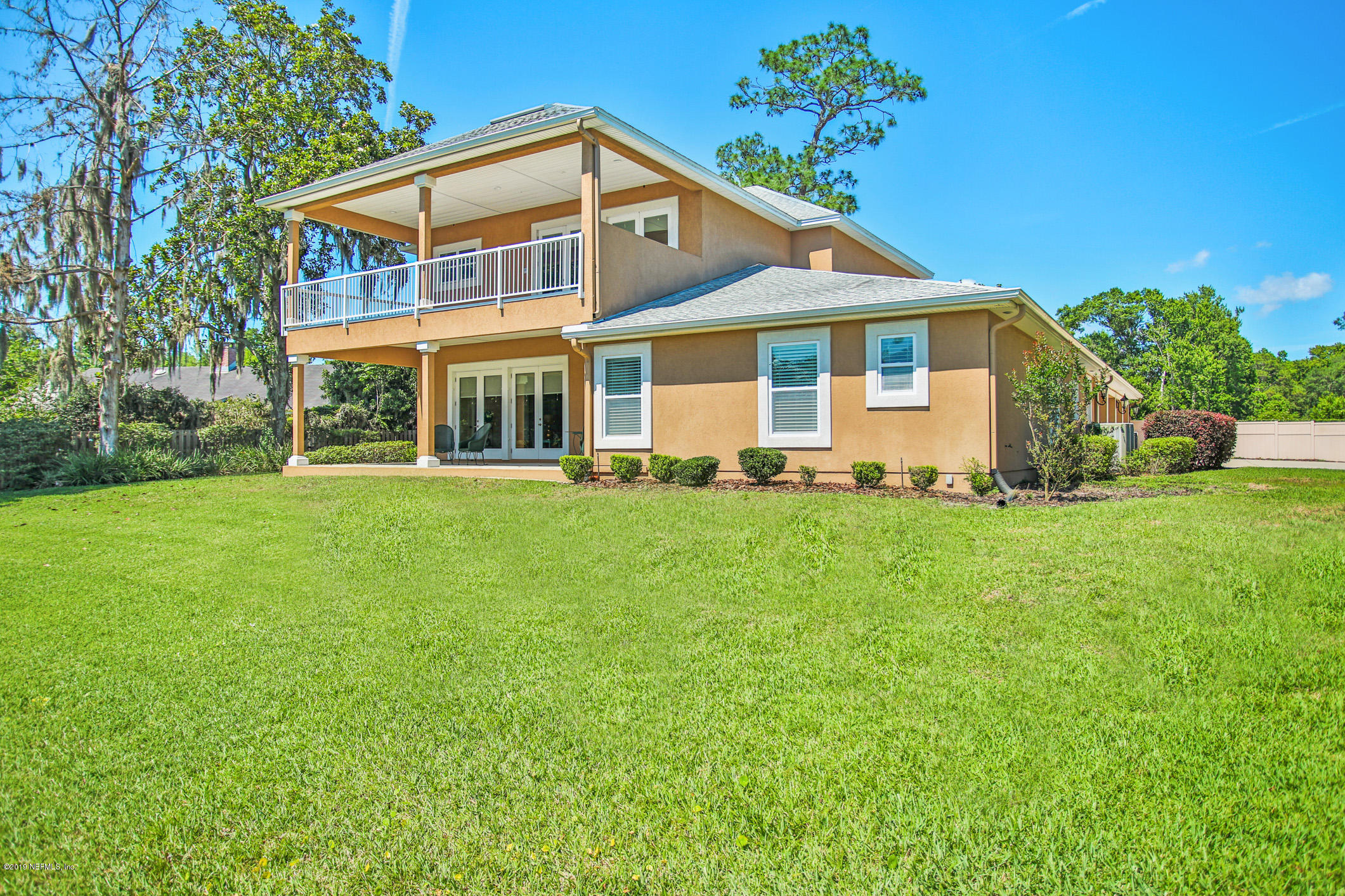 7936 Pine Lake Road Jacksonville, FL 32256 - Photo 60 of 70 a front view of a house with a yard