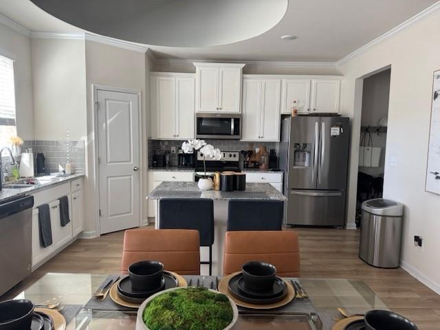 503 Hancock Drive Southeast Atlanta, GA 30354 - Photo 5 of 14 a kitchen with stainless steel appliances a refrigerator a stove a sink and a stove